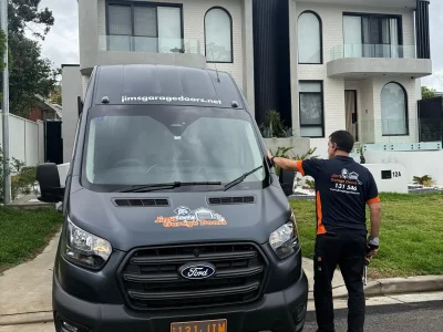 Jims Garage Doors Technician Arriving Residential Service Van